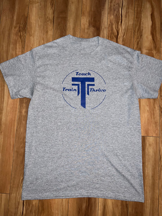 Grey T-shirts with our teach-train-thrive logo